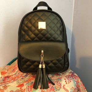 Faux Leather quilted back ack